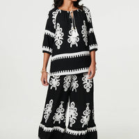 Ikat Print Tassel Tie Neck Blouse