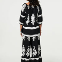 Ikat Print Tassel Tie Neck Blouse