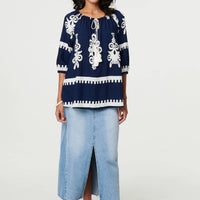Ikat Print Tassel Tie Neck Blouse
