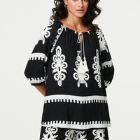 Ikat Print Tassel Tie Neck Blouse