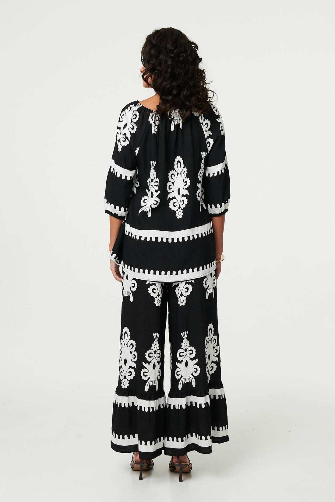 Ikat Print Tassel Tie Neck Blouse