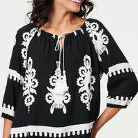 Ikat Print Tassel Tie Neck Blouse