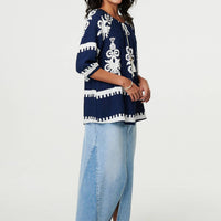 Ikat Print Tassel Tie Neck Blouse