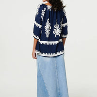 Ikat Print Tassel Tie Neck Blouse