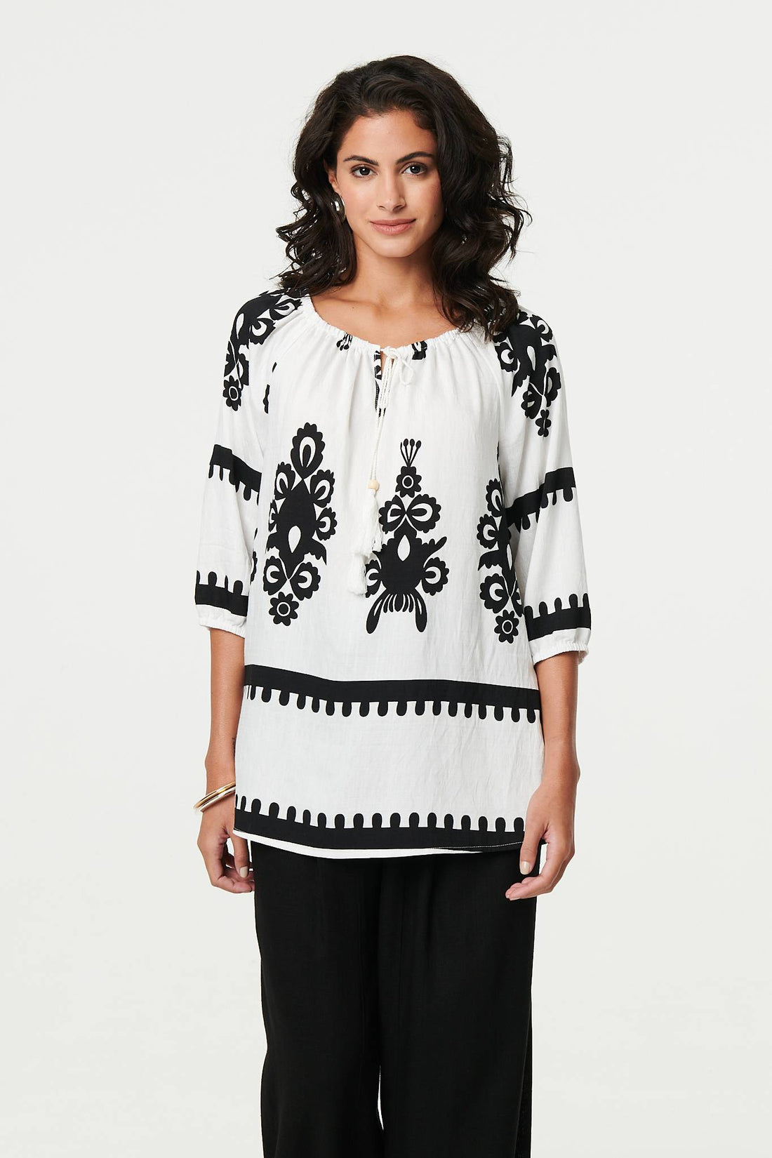 Ikat Print Tassel Tie Neck Blouse
