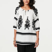 Ikat Print Tassel Tie Neck Blouse