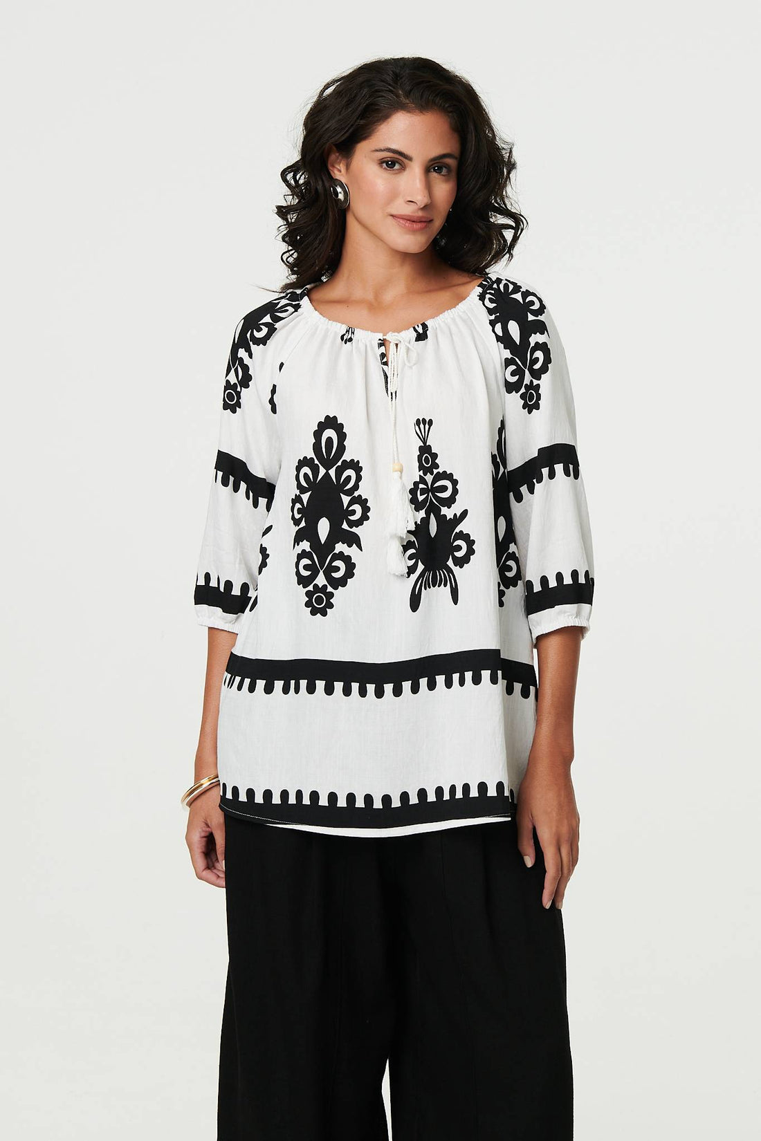 Ikat Print Tassel Tie Neck Blouse